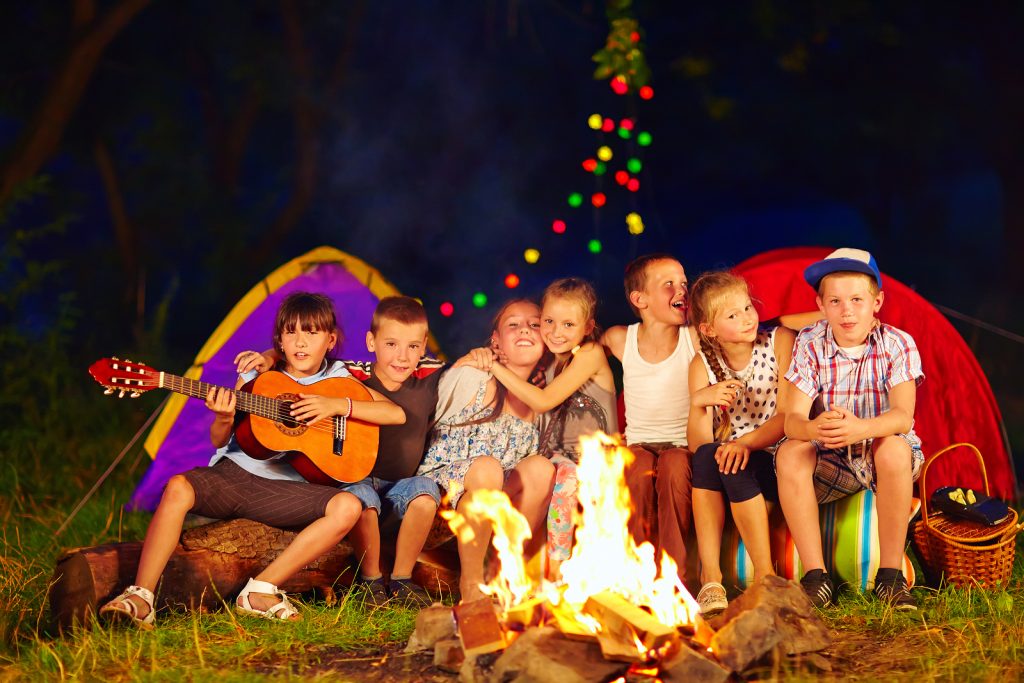 Happy Kids Singing Songs Around Camp Fire happy kids singing songs around camp fire