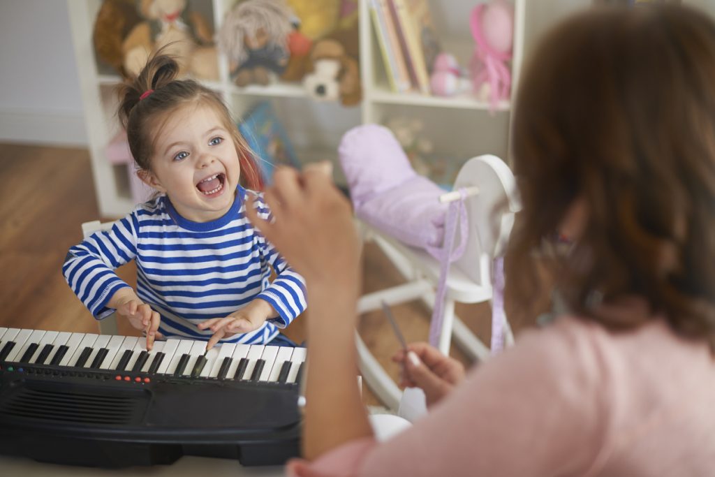 Singing and playing on musical instruments with my mommy