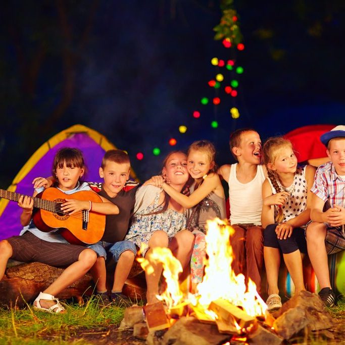 Happy Kids Singing Songs Around Camp Fire happy kids singing songs around camp fire